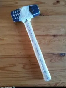 Meme: Nokia 3310 used as a hammer