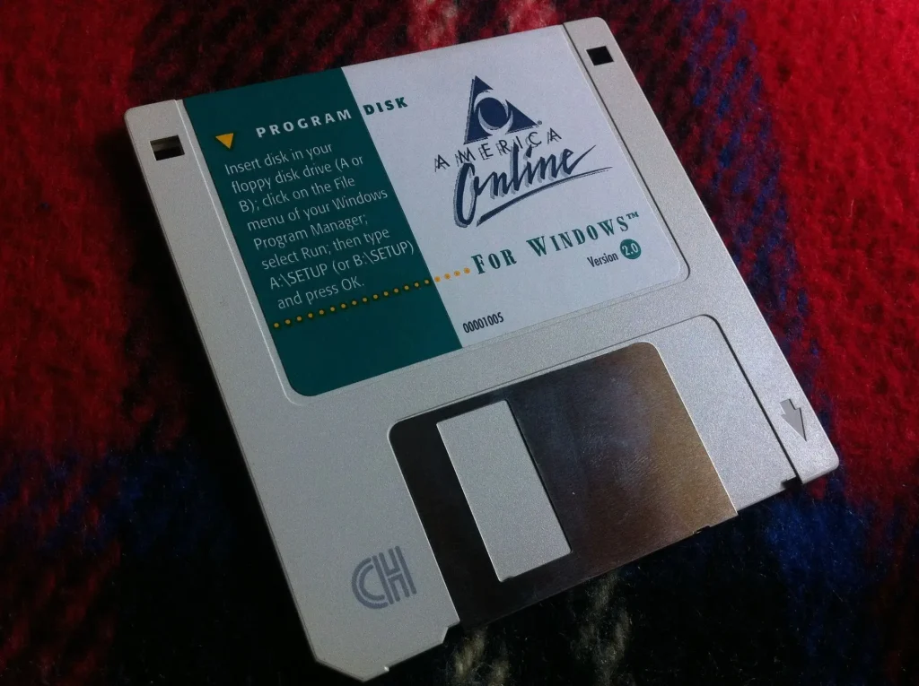 The Rise and Fall of AOL: How It Ruled the Early Web 2 America Online version 2.0 program disk for Windows