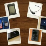 A collection of six retro-style Polaroid photographs of consumer electronics, arranged in a circle on a dark wood table. The devices include an Apple Newton MessagePad, Google Glass, Amazon Fire Phone, modern Apple iPhone and Watch on a charging mat, a Microsoft Zune, and a BlackBerry Q10. The arrangement evokes a nostalgic, museum-like gallery.